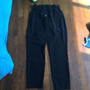 lululemon on the fly woven black jogger pants